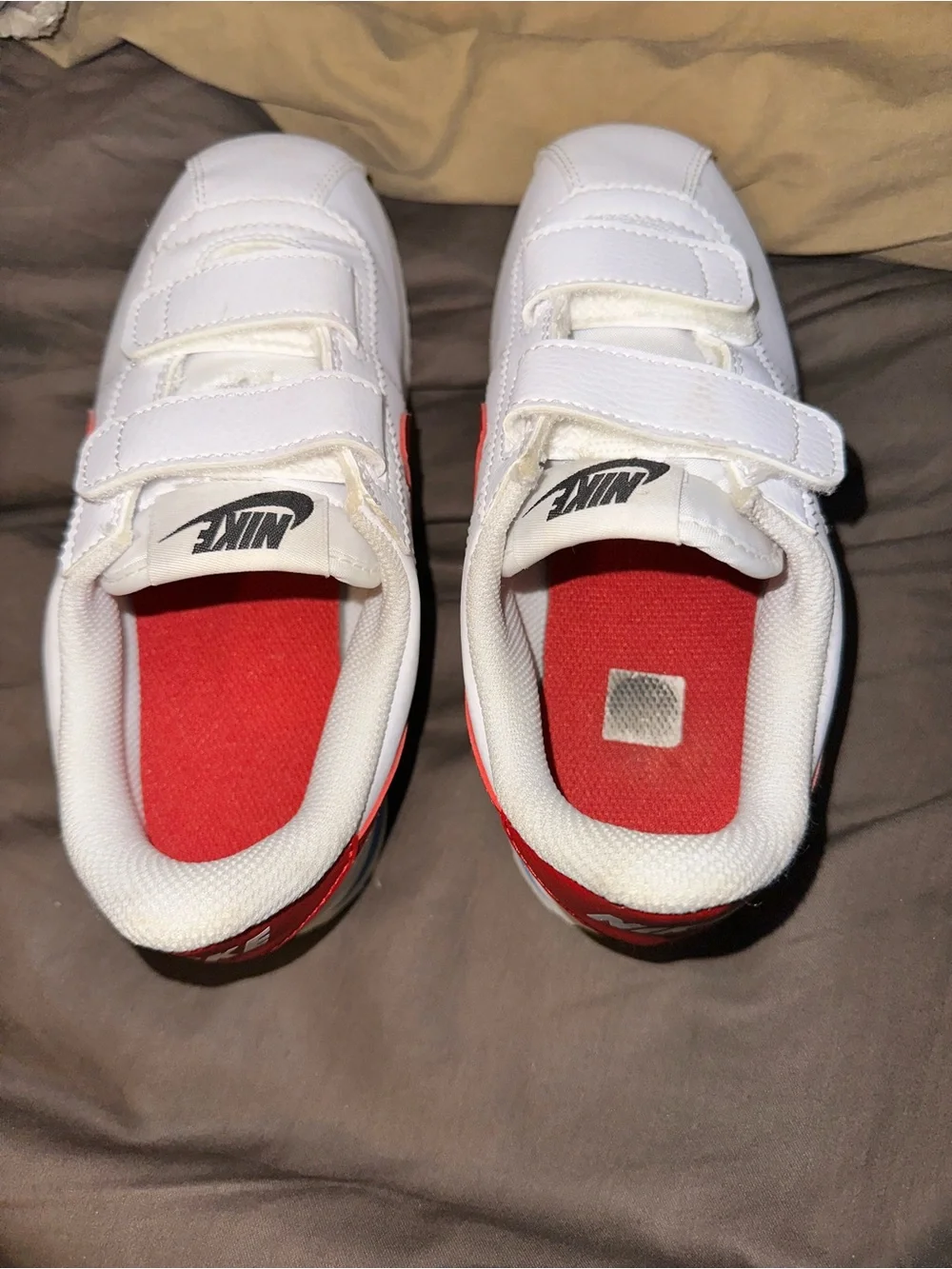Nike Kids White Sneaker with Red Swoosh